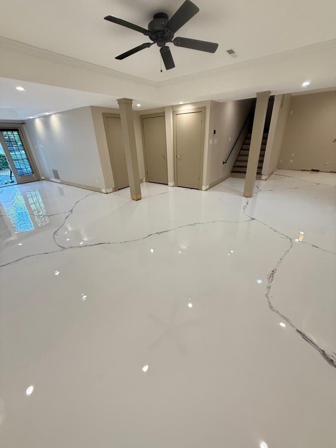 White Marble metallic floor on a real job — basement