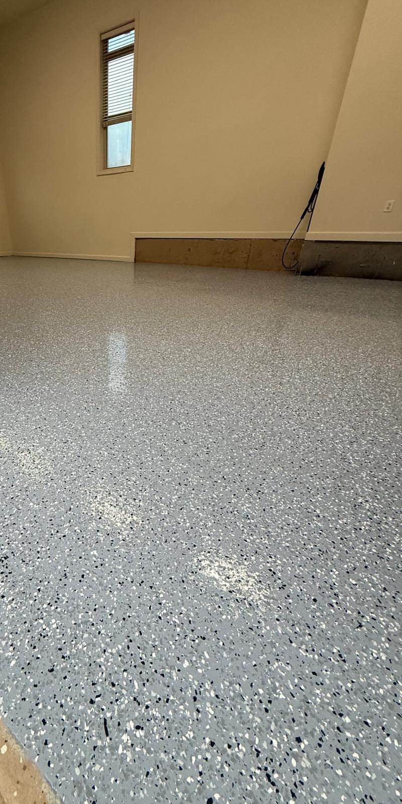 Light grey flake, bonus room — a real floor finished by Epoxy Living