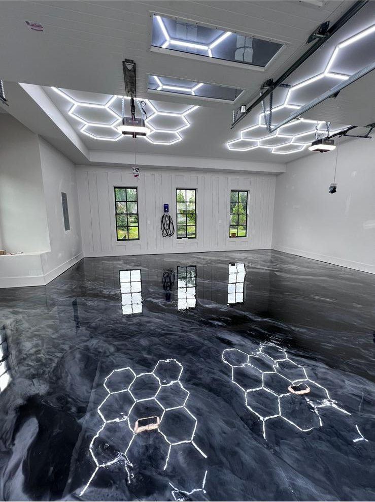 Charcoal metallic, garage with hex lights — a real floor finished by Epoxy Living